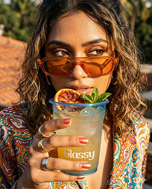 Person relaxing with blue cup
